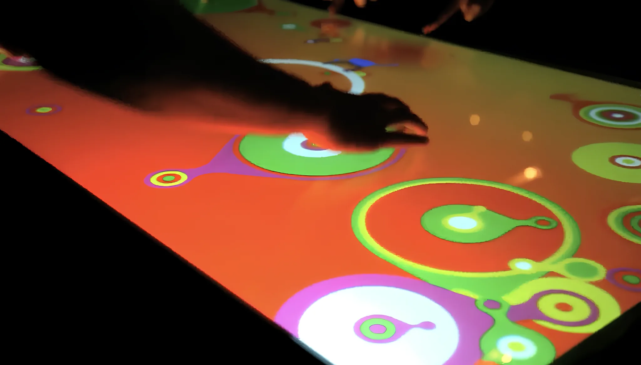 Airside Multi Touch is an interactive experience for an agency anthology launch using animated games and Seeper's 'seetouch' hardware.