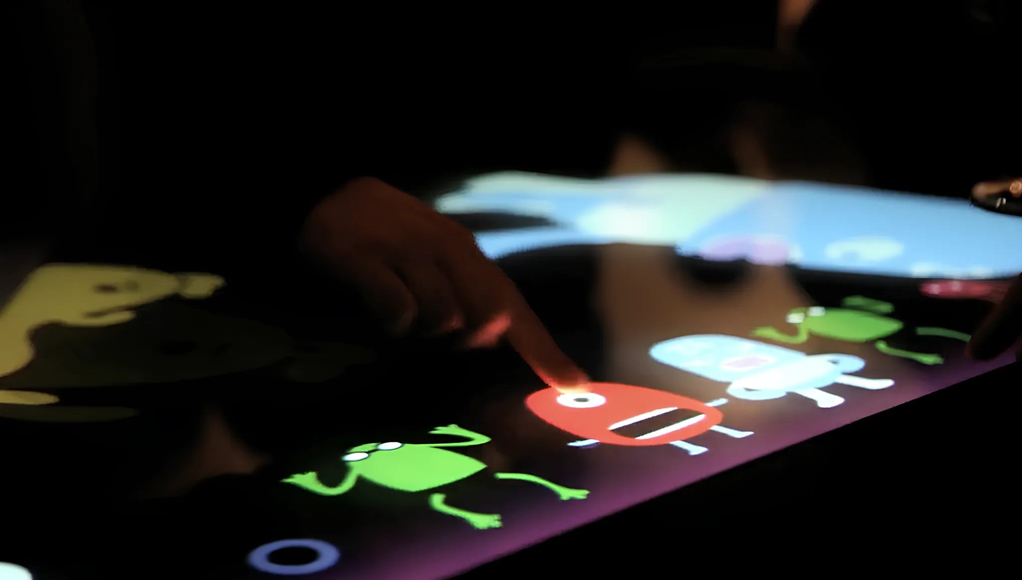 Airside Multi Touch is an interactive experience for an agency anthology launch using animated games and Seeper's 'seetouch' hardware.